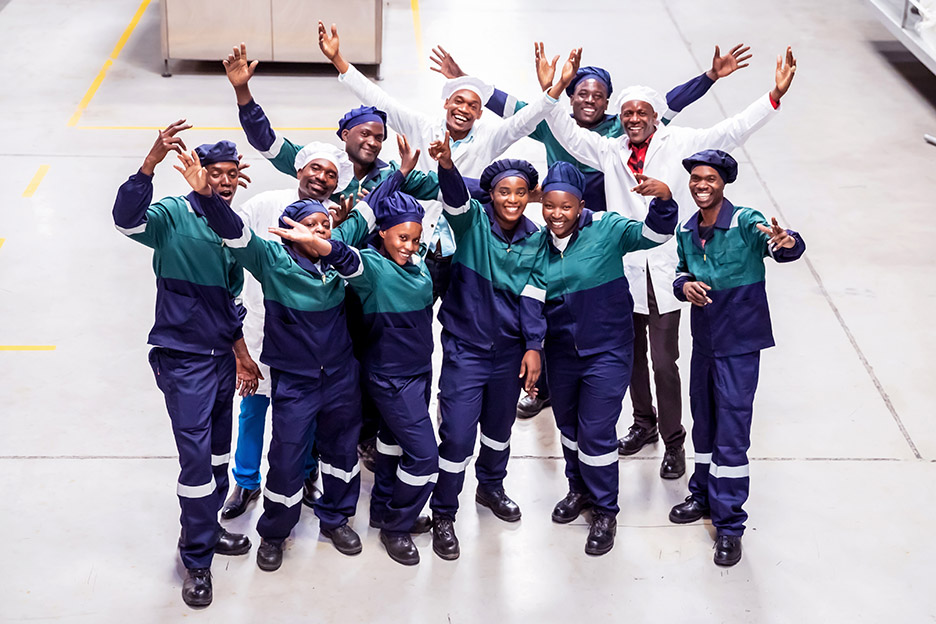 young people in working dress cheering